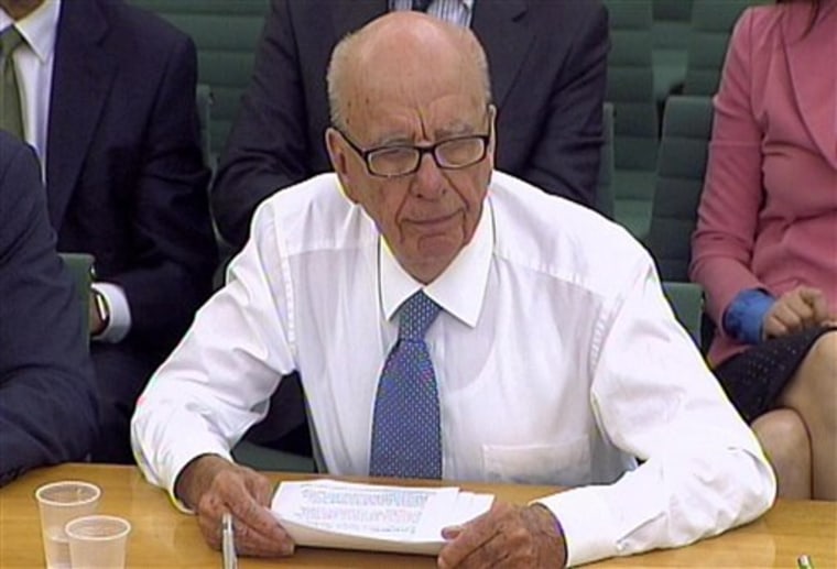 Asked whether he was considering resigning as head of News Corp., Rupert Murdoch said: "No."